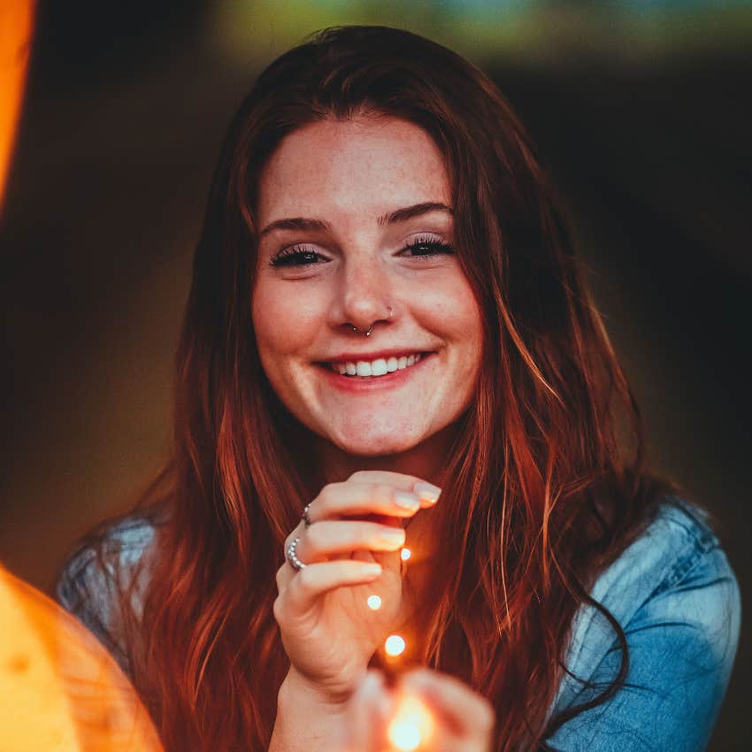 happy woman who is a good person smiling