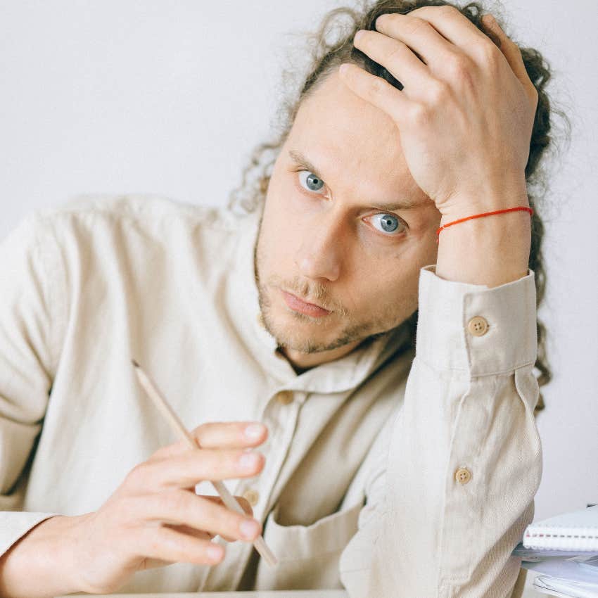 man used to planning annoyed by inconvenience at work