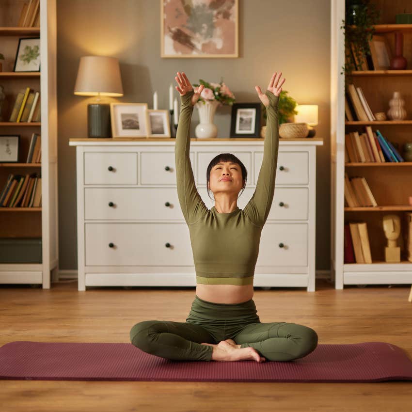 woman doing her yoga hobby is happier because it gives her a sense of flow in her brain