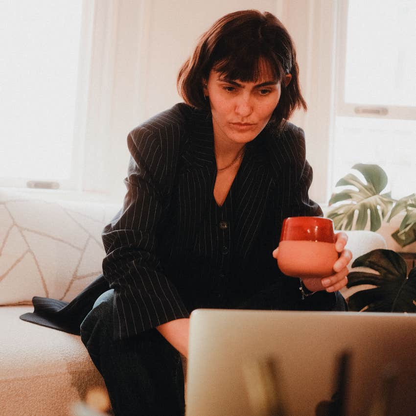 lonely woman working from home on her computer