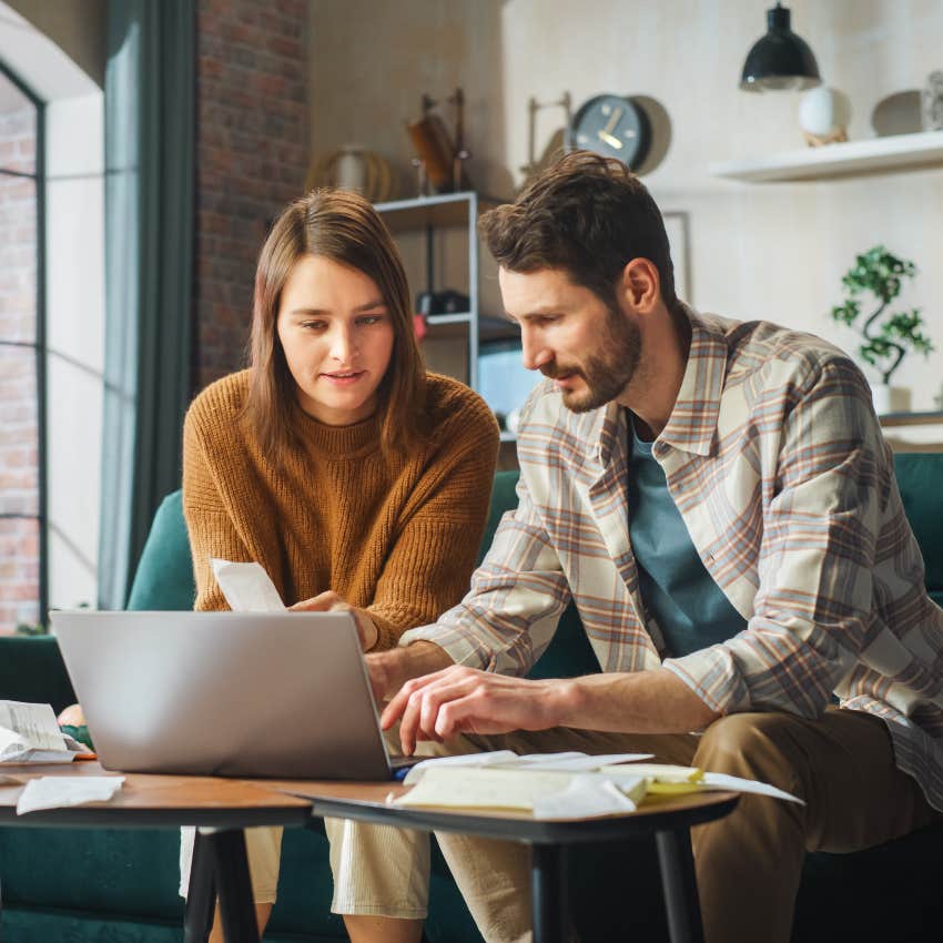 young couple who splits their bills