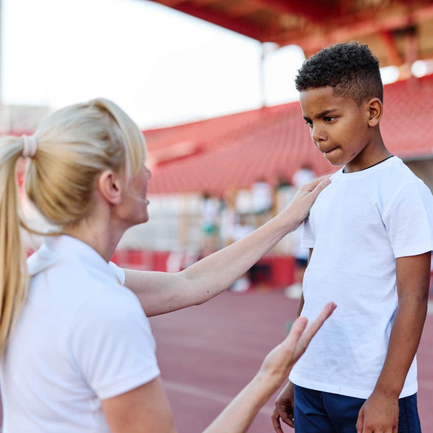 boy learning to take constructive criticism from a coach