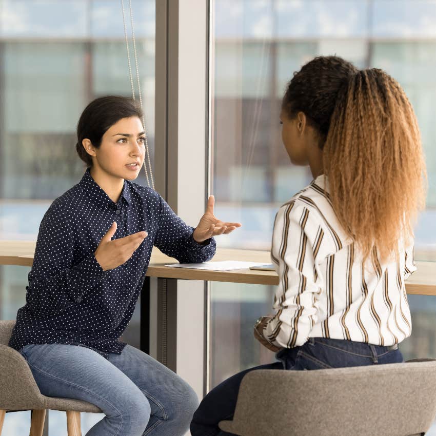 emotionally intelligent woman telling her friend she won't tolerate her hurtful defense mechanisms