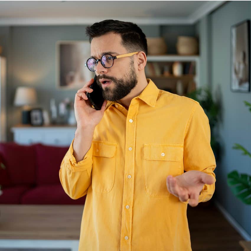 emotionally intelligent man on the phone telling friend he won't tolerate his selfishness