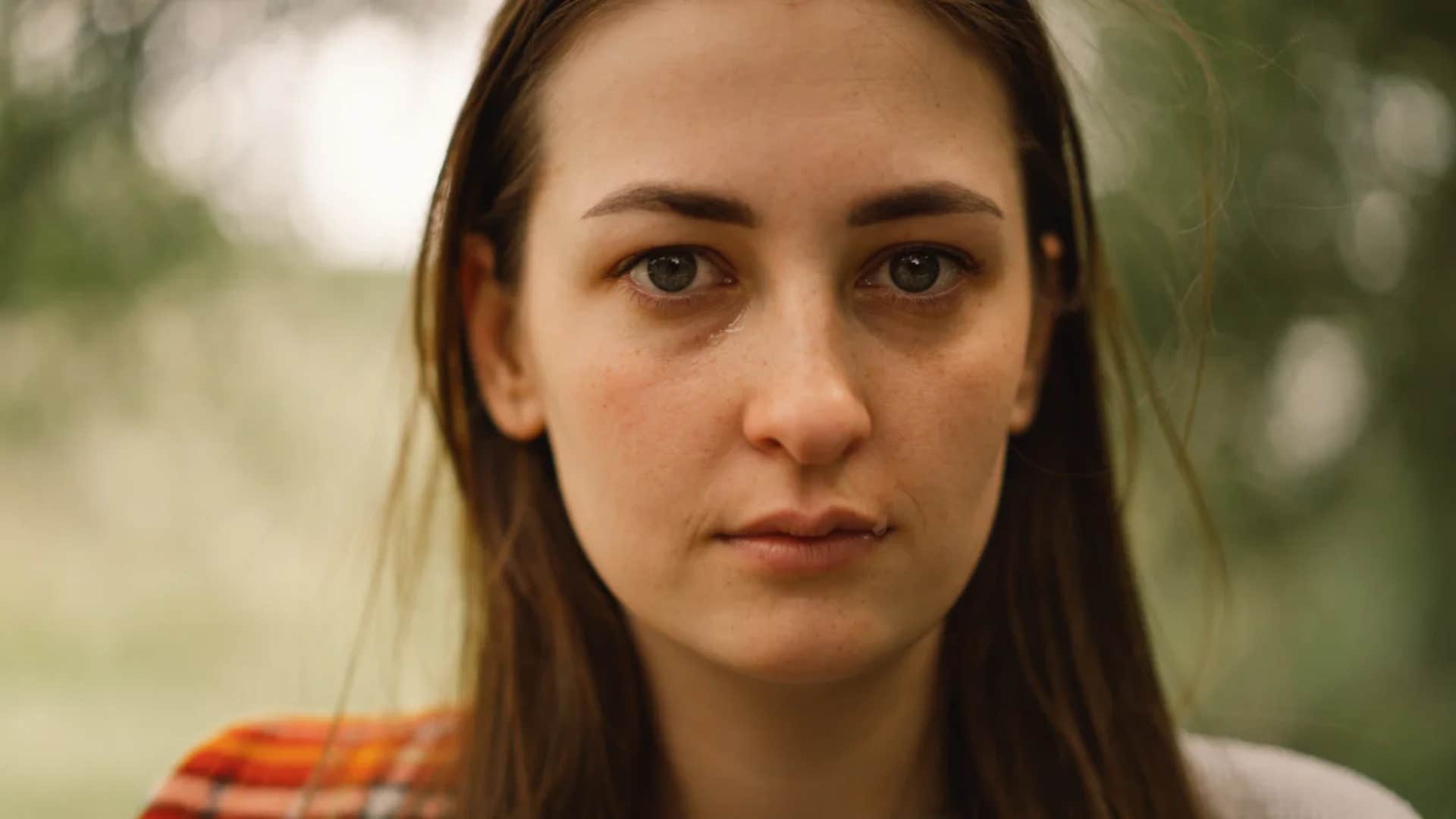 gen z woman getting teary eyed because she wants people to stop making fun of safe spaces