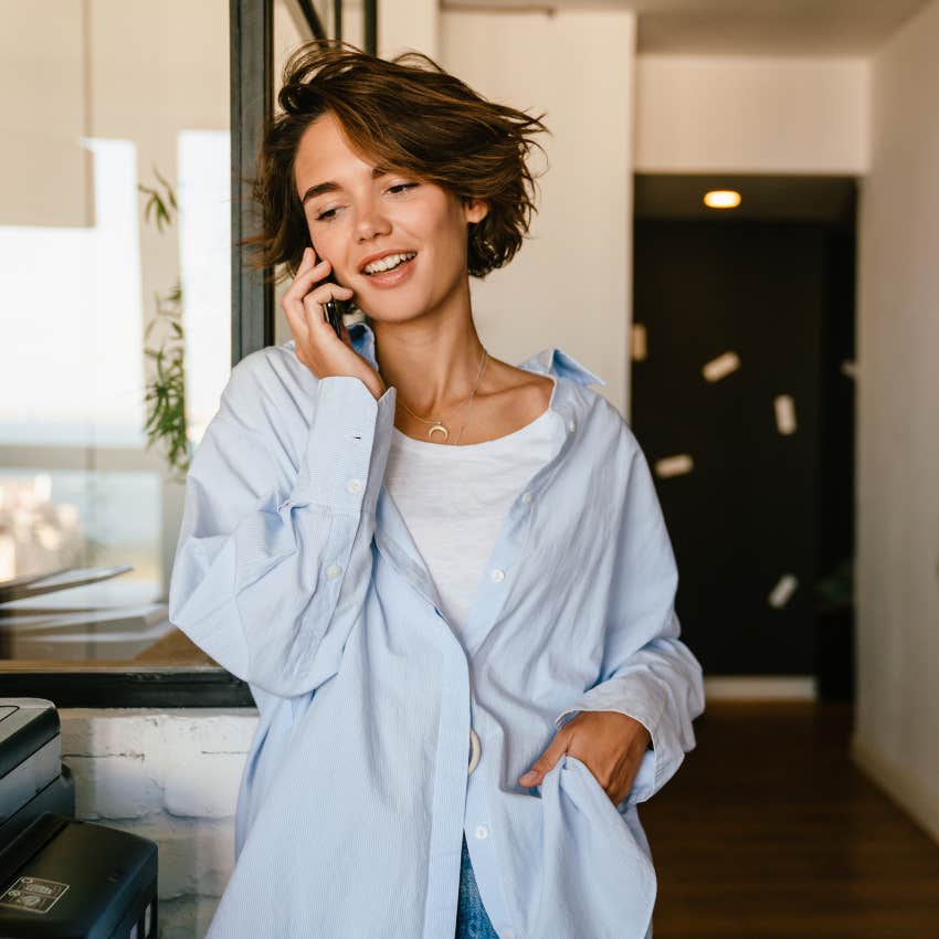 insecure woman on phone being overly available to new love interest