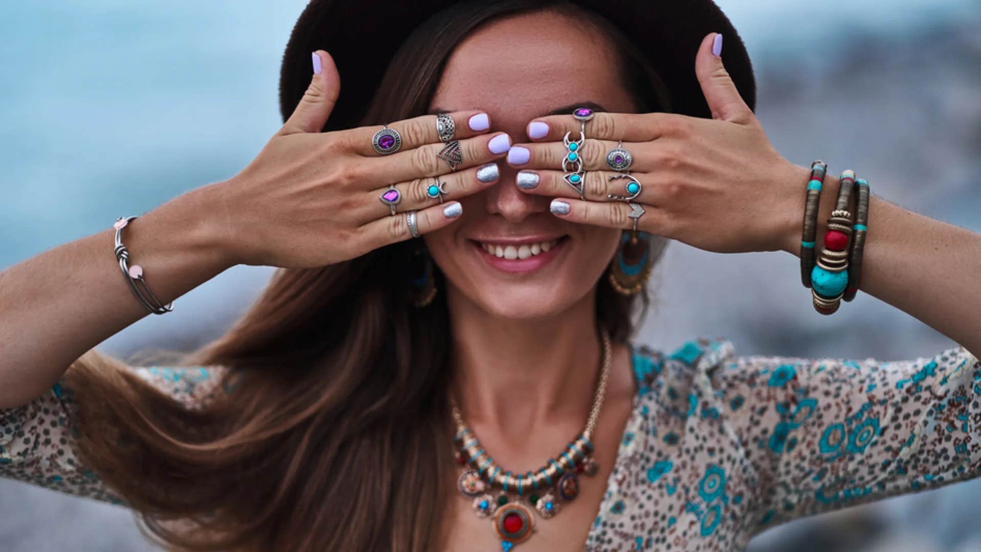 insecure woman wearing lots of accessories that she can hide behind