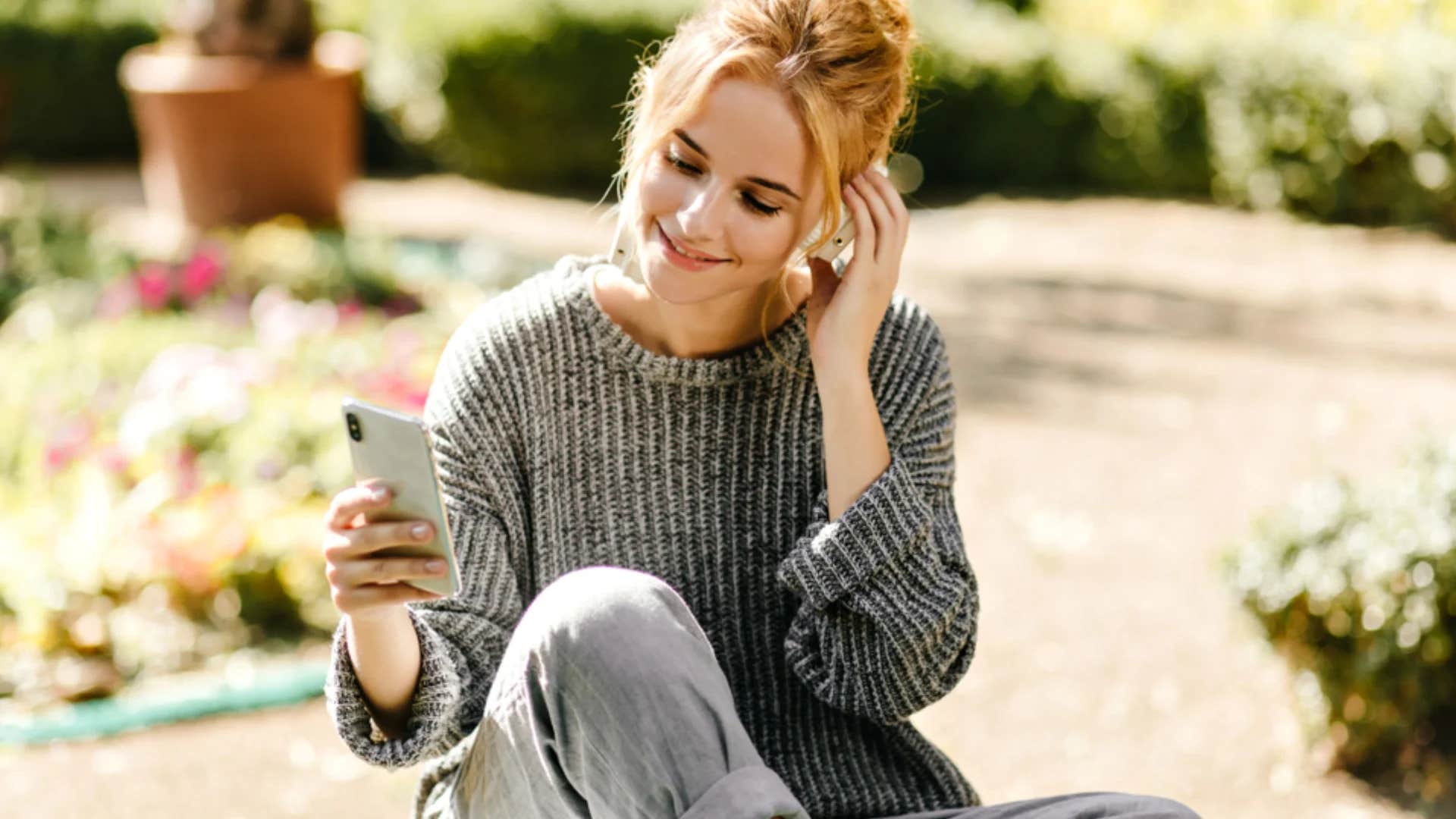 insecure woman wearing sweater and pants that hide her skin