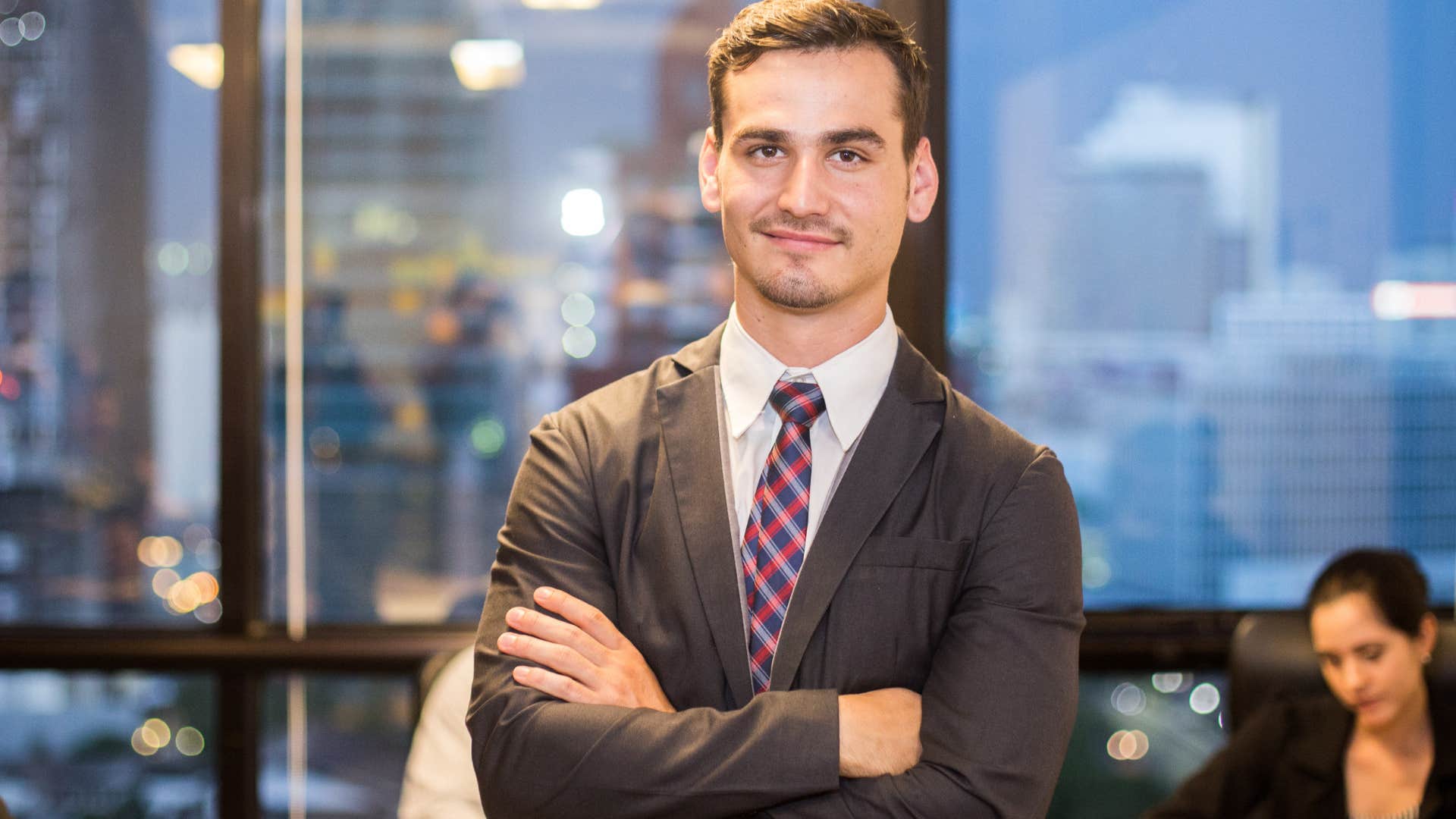 insecure man in ill-fitted timeless cut suit hoping no one looks at him