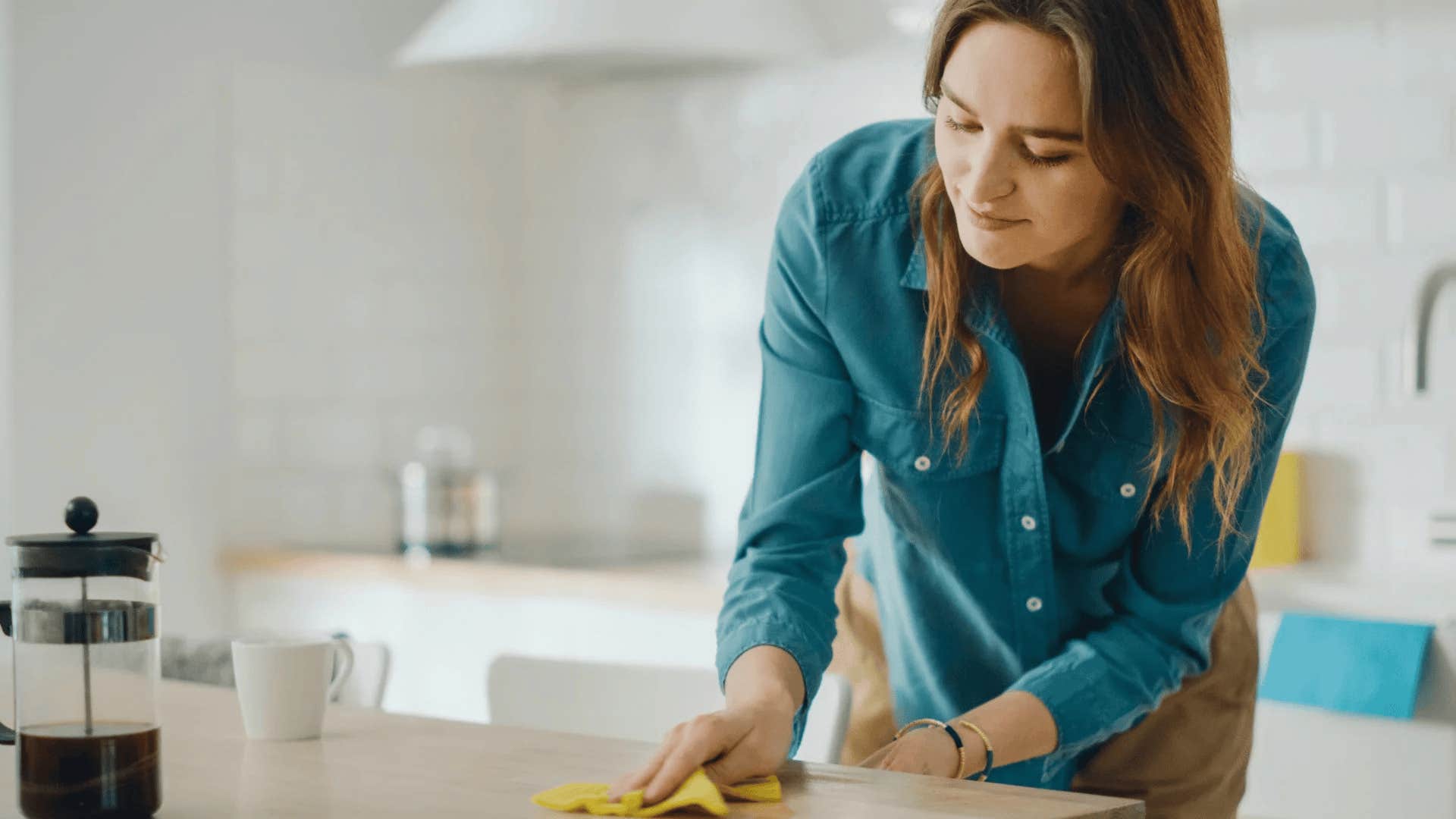 frugal woman not using paper products for cleaning