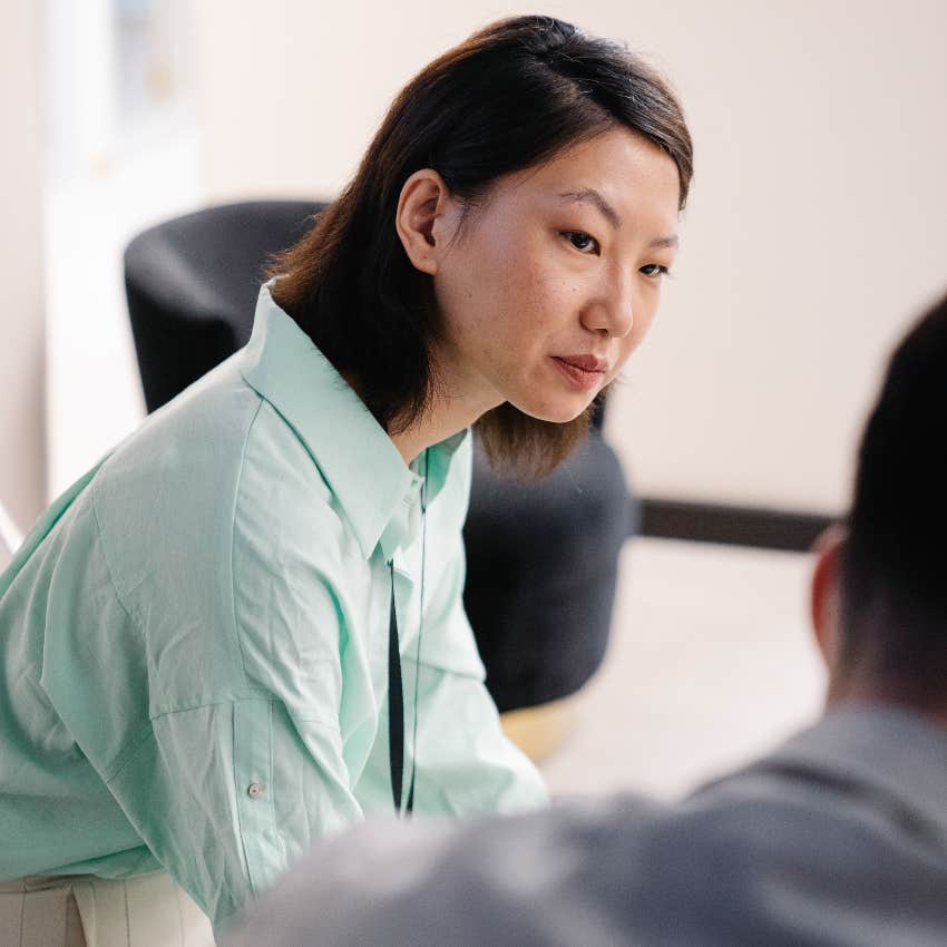 annoyed woman unwilling to tolerate chronic complainer colleague