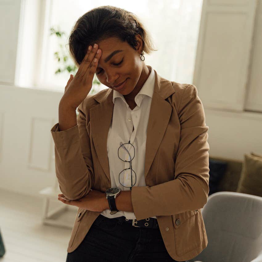 smiling woman embracing her mistakes looking happy