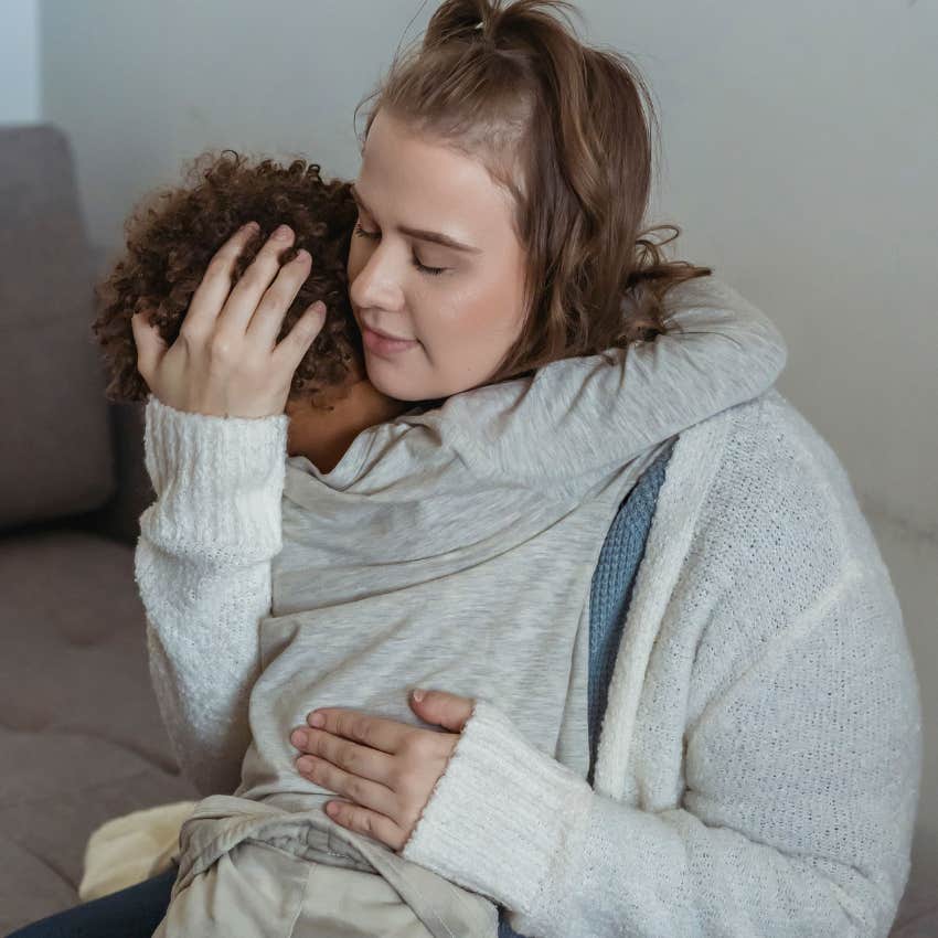 mom comforting her child saying i'm proud of you for trying