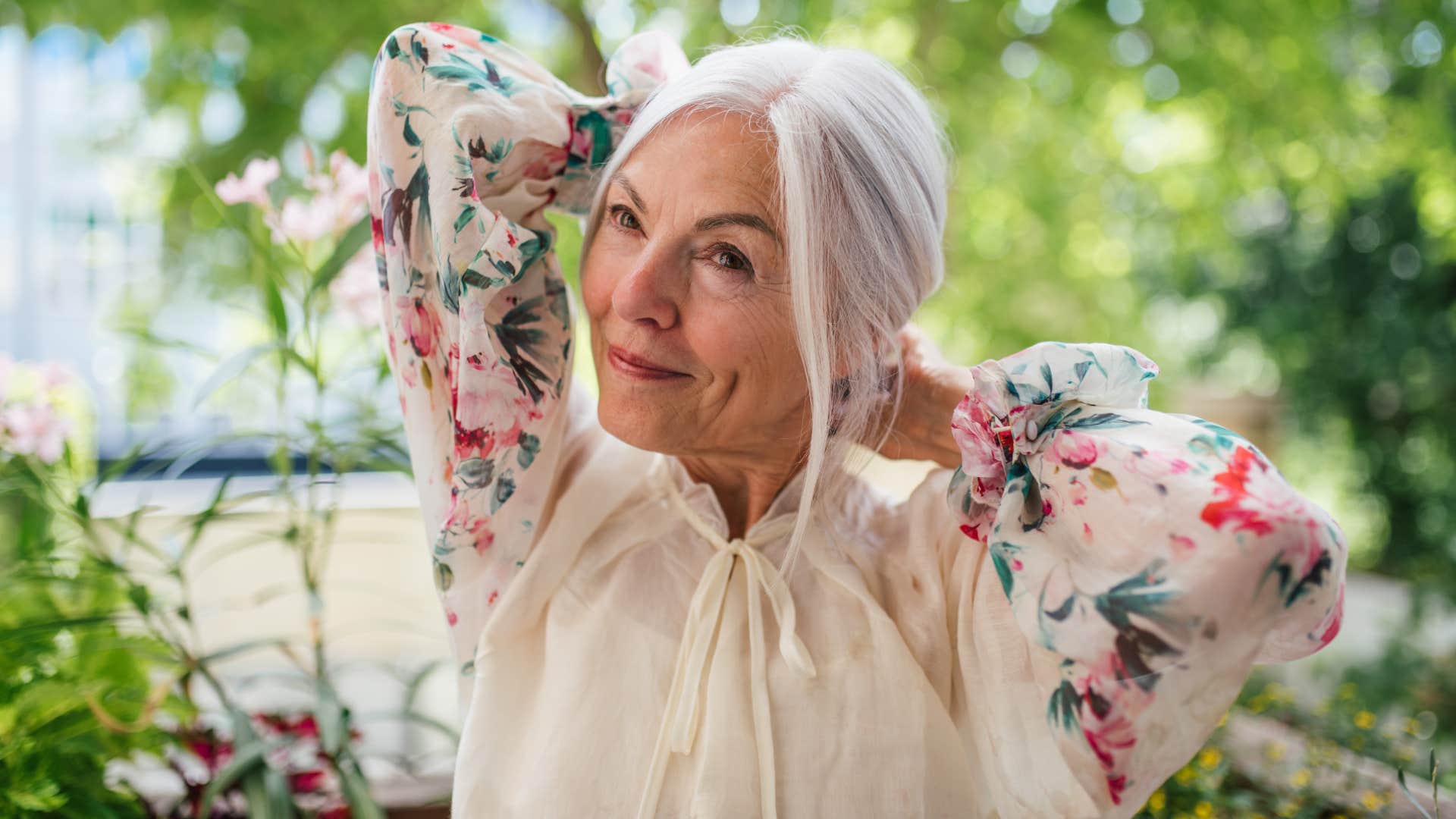 mature woman with mental and emotional integrity smiling because she doesn't let others affect her mood