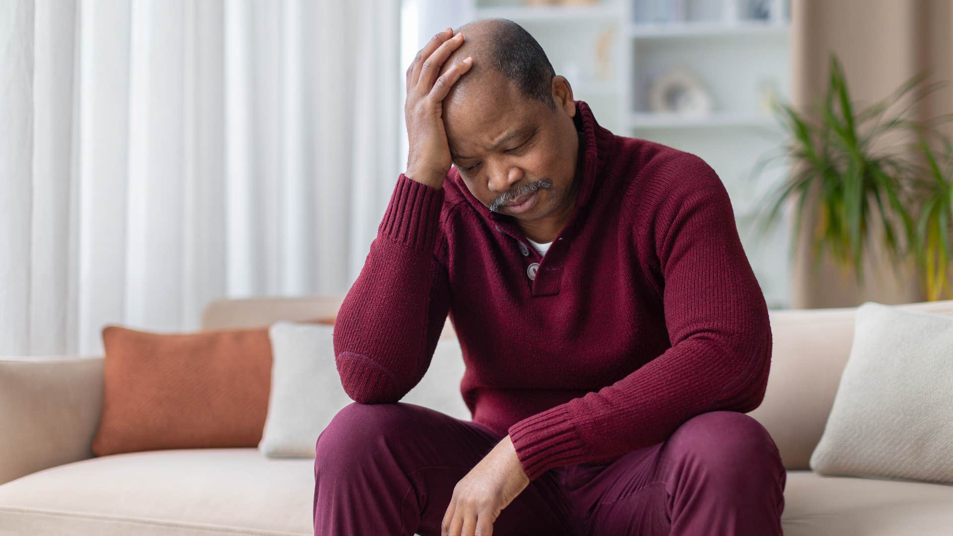 mature man with mental and emotional integrity not telling others he's fine when he is feeling sad
