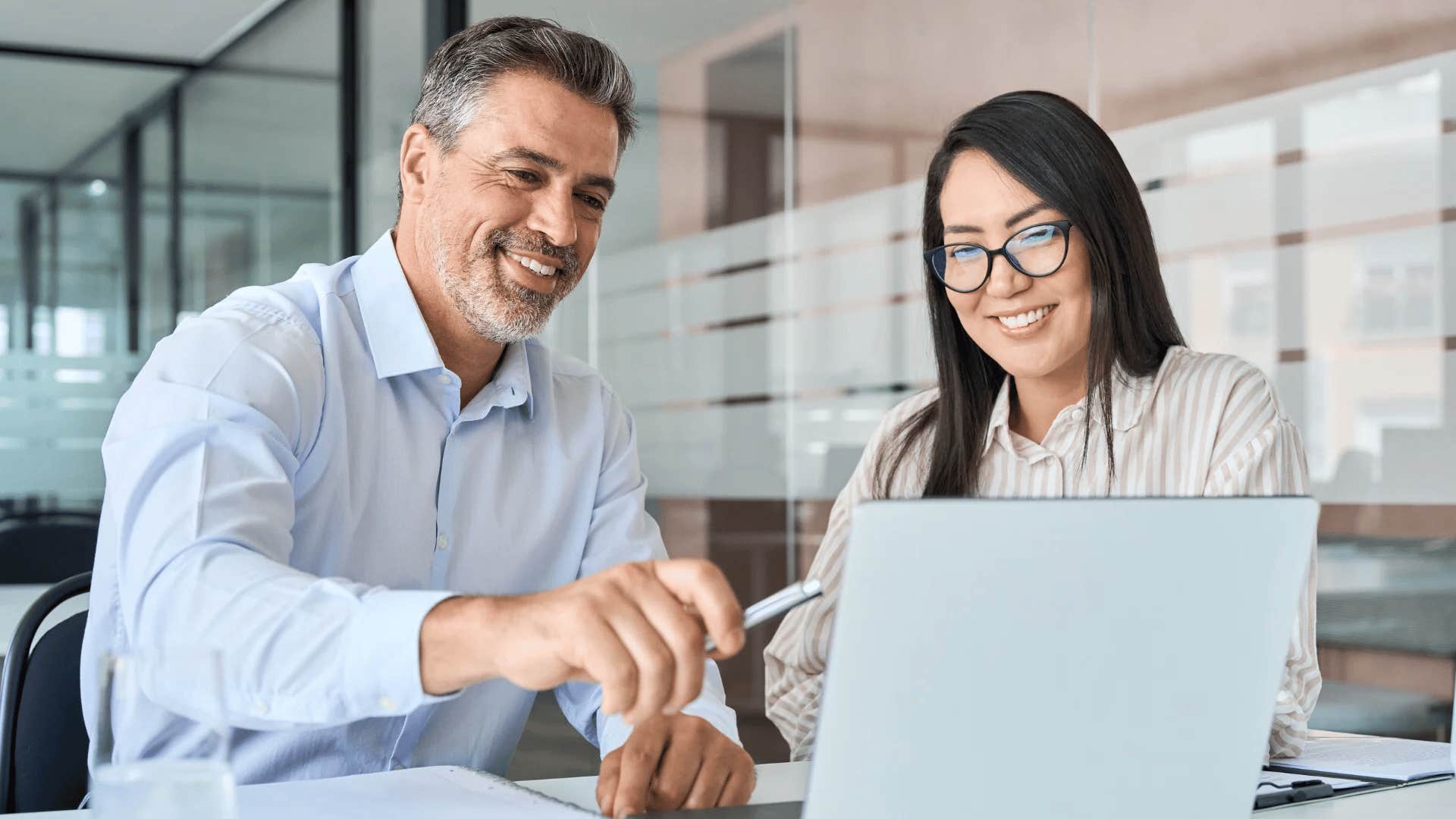 man expressing gratitude and appreciation for colleague helping him