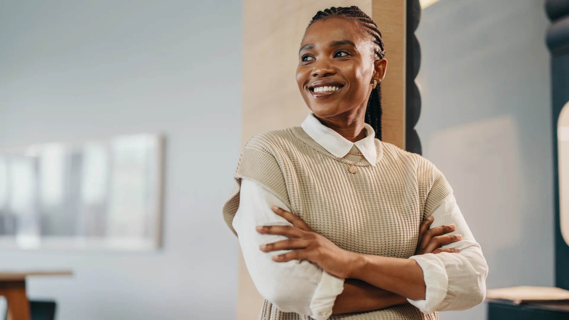 happy employee reflecting on her personal values at work