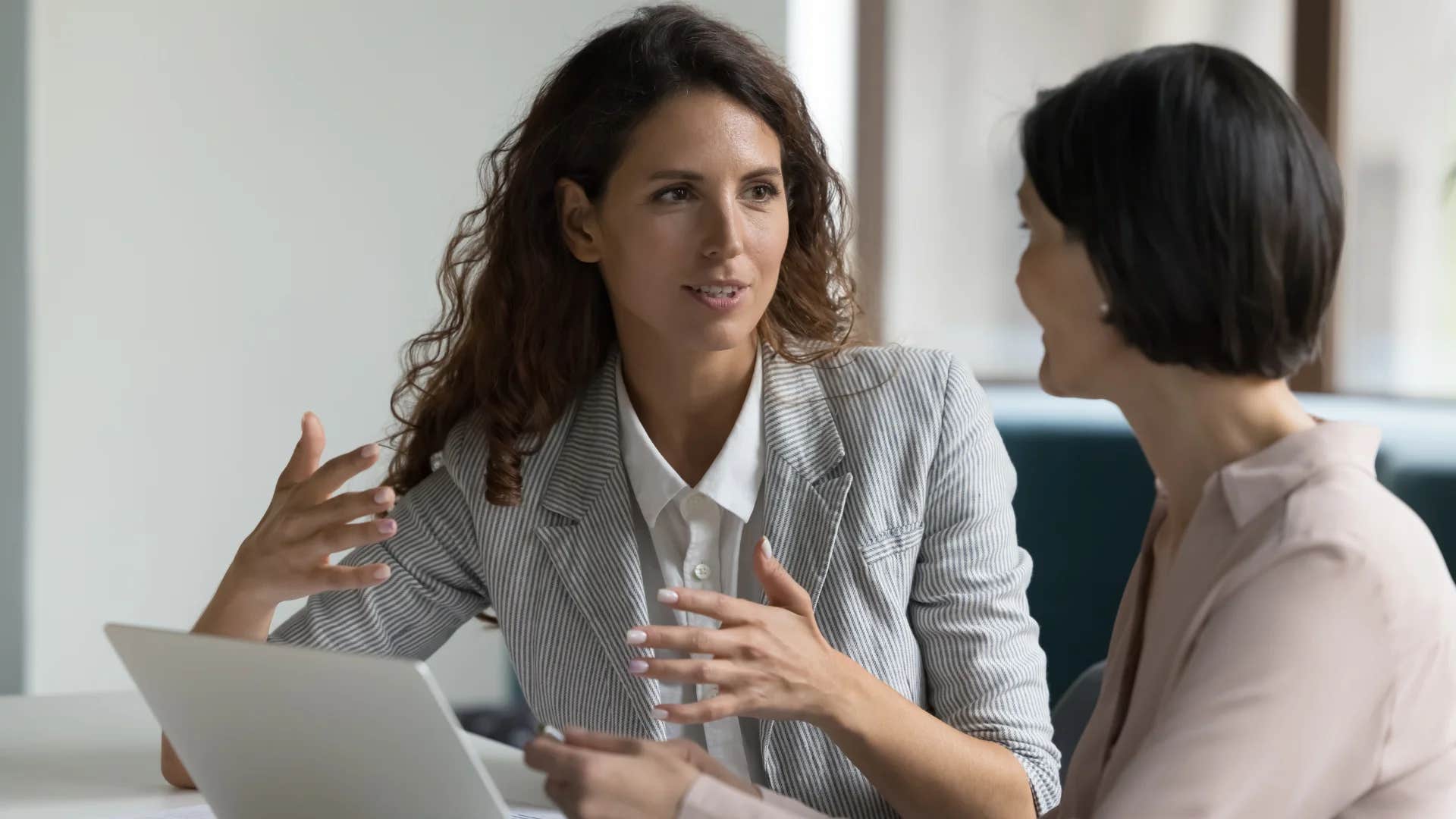 happy worker setting healthy boundaries with her colleague