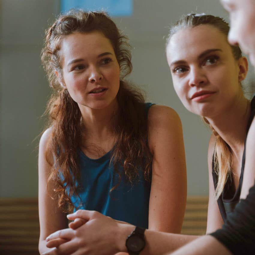 intelligent woman questioning friend's views in conversation