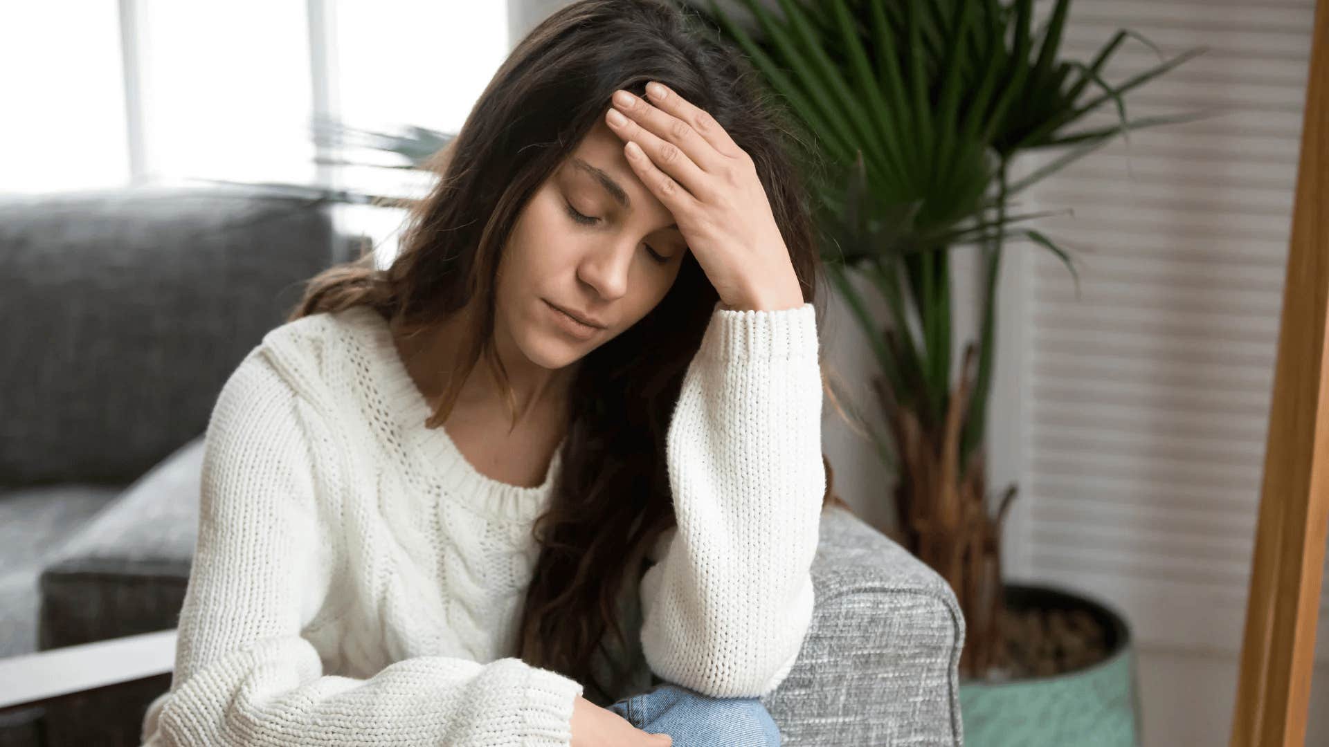 woman thinking maybe she can change the person she's in an unsafe relationship with
