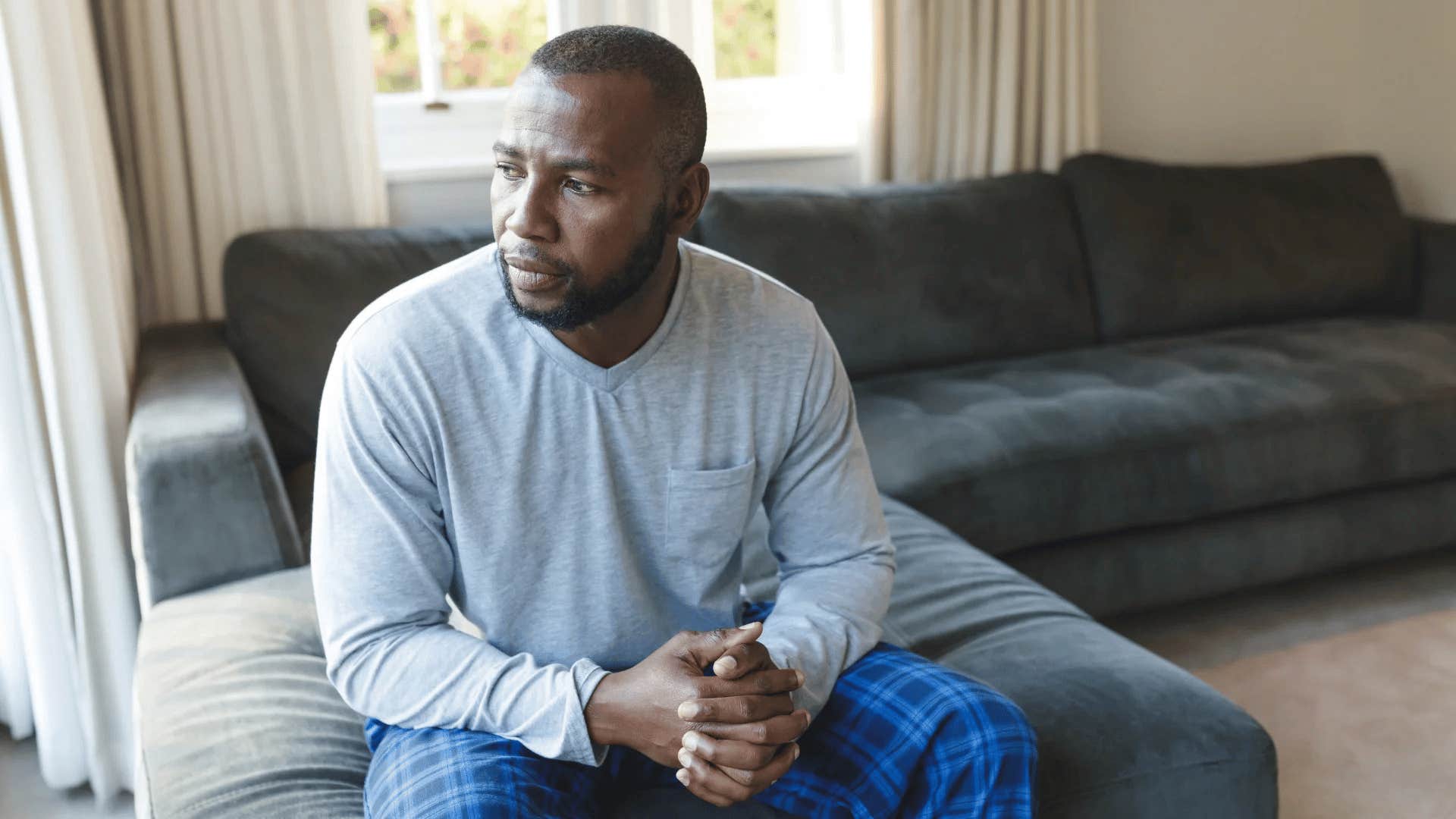 man wondering who he can ask for help after realizing his relationship isn't safe