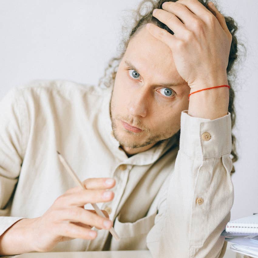 burnt out worker feeling annoyed he wasn't fired