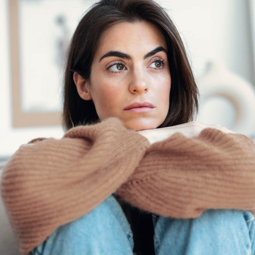woman who is less satisfied with her life because she moved a lot as a kid
