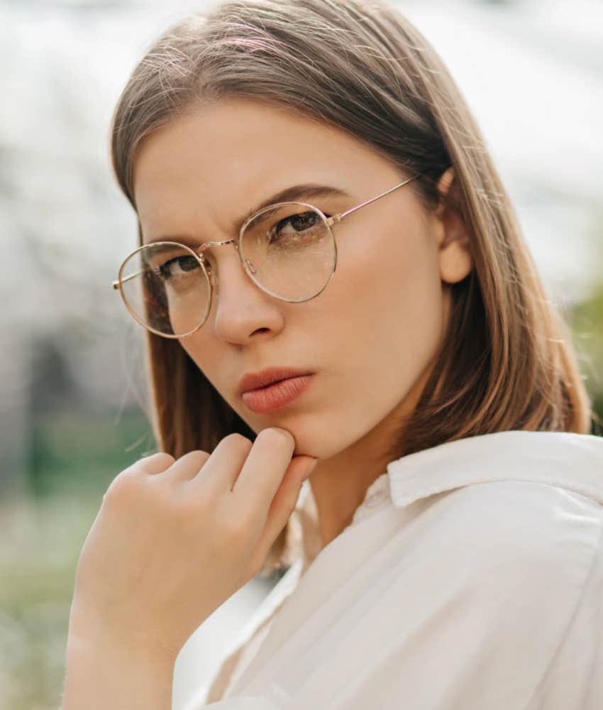 passive-aggressive woman in glasses who is afraid of being alone 