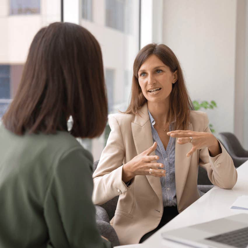 two professional women talking