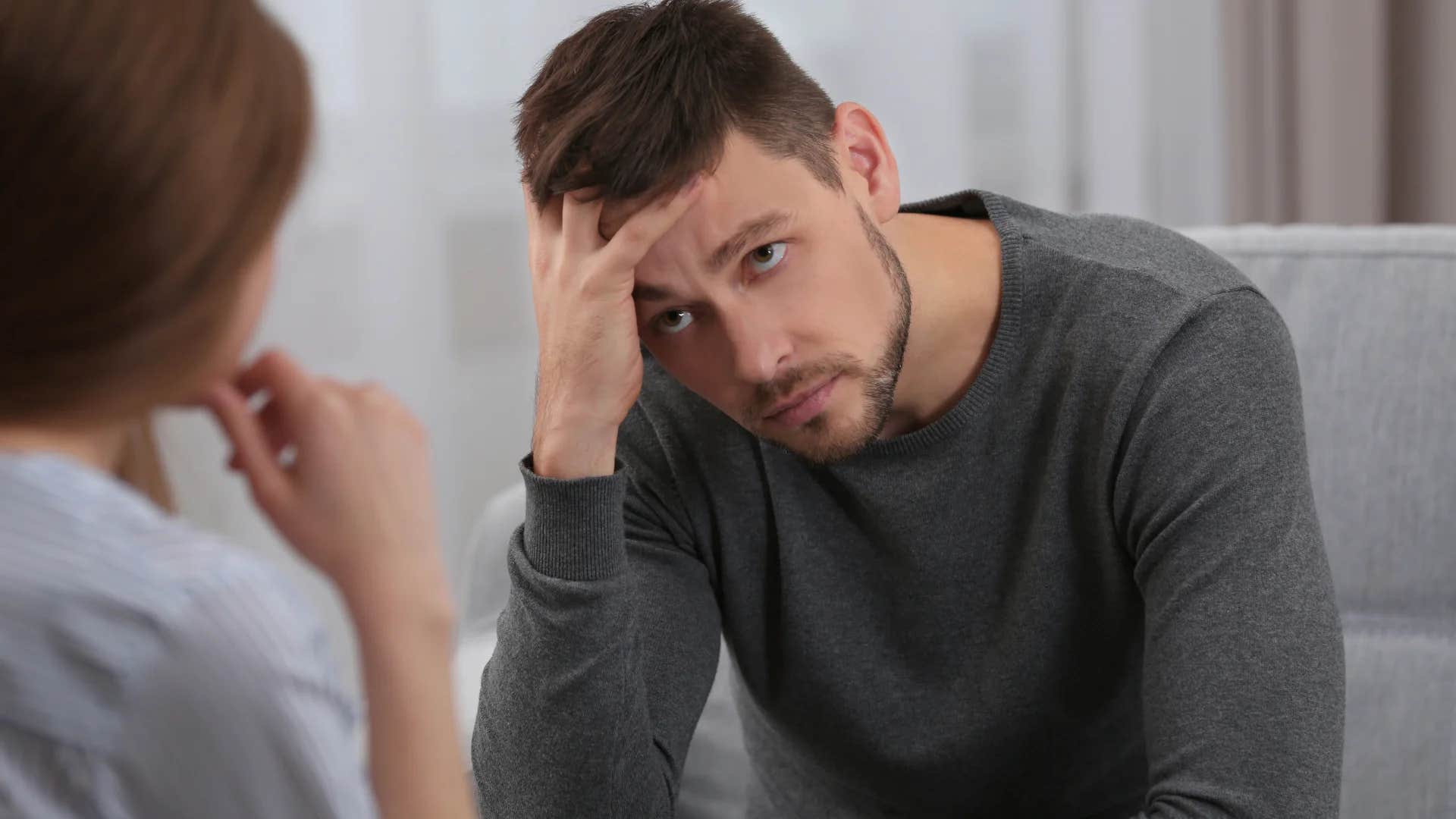 man being told by woman i'm only trying to help you