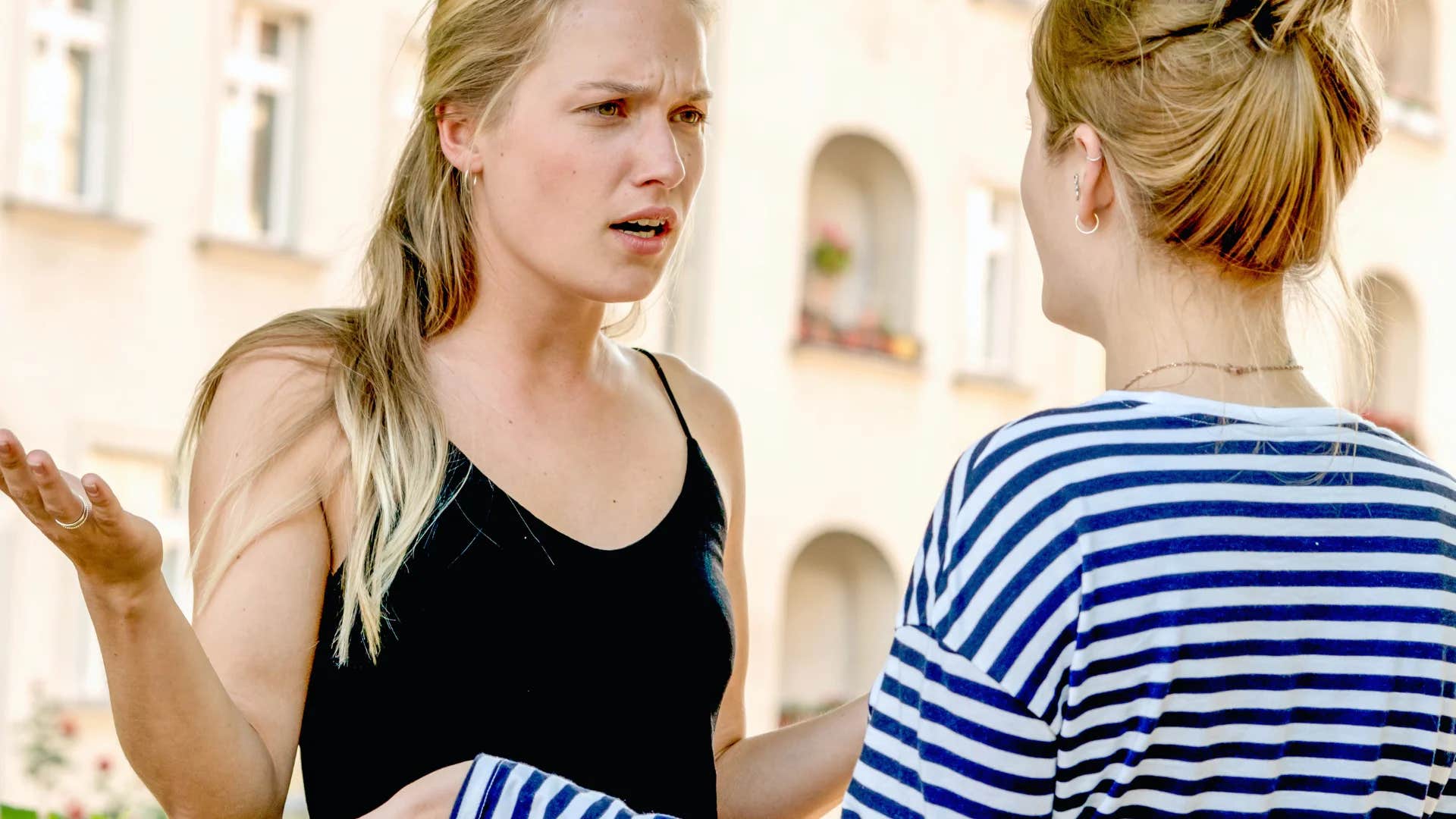 woman telling her friend you're being dramatic