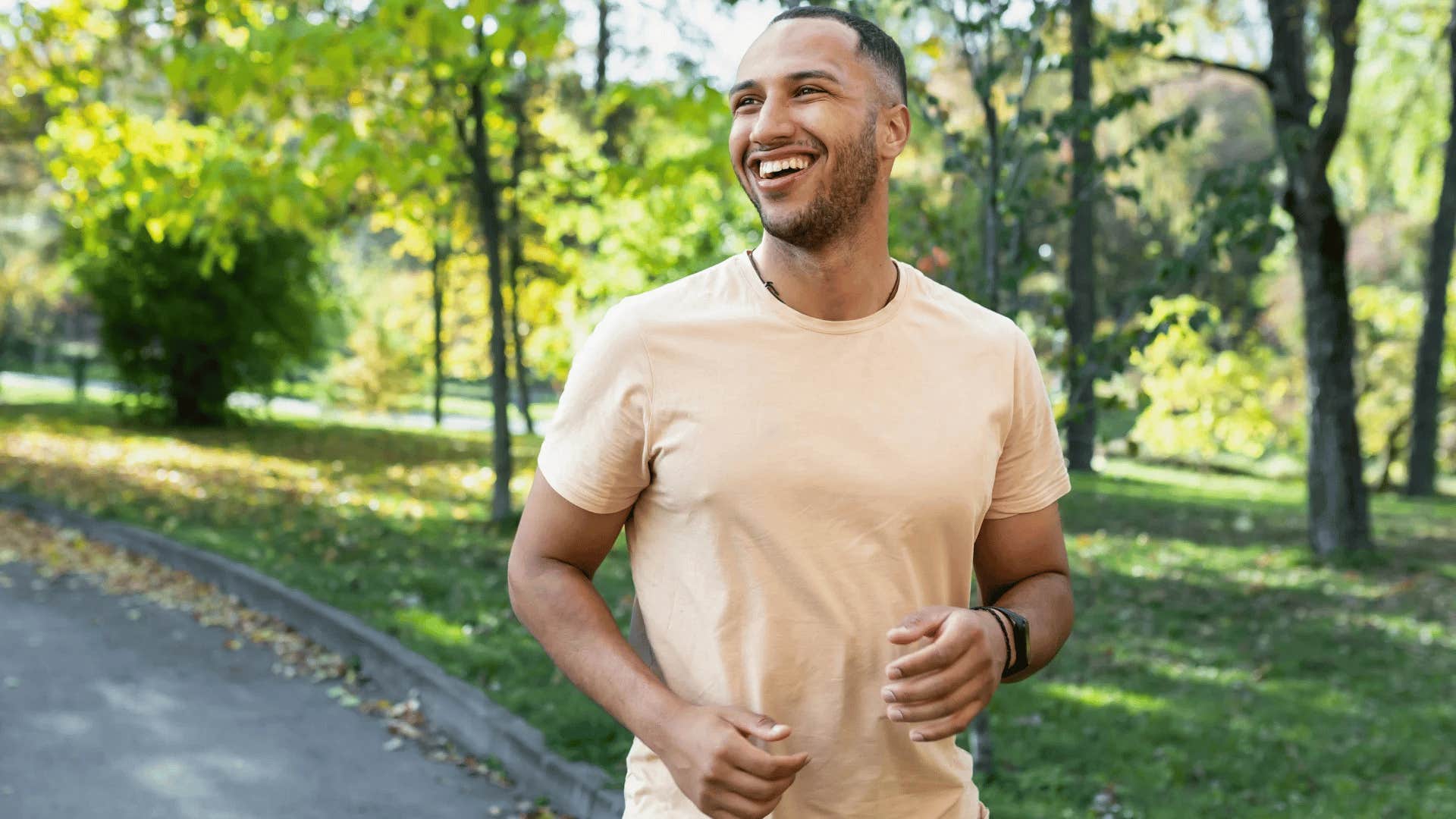 happy man going on a run by himself