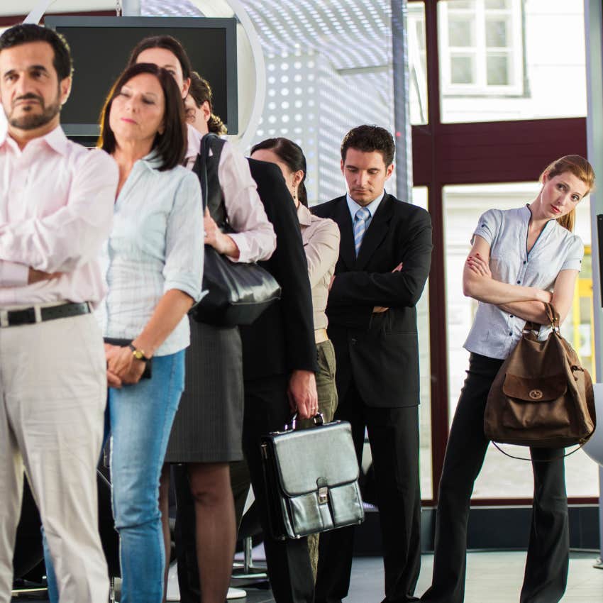 millennial woman waiting in a line