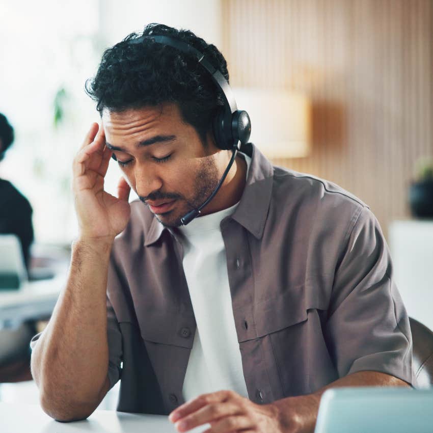 man wondering why he is still at his job after realizing he hates it