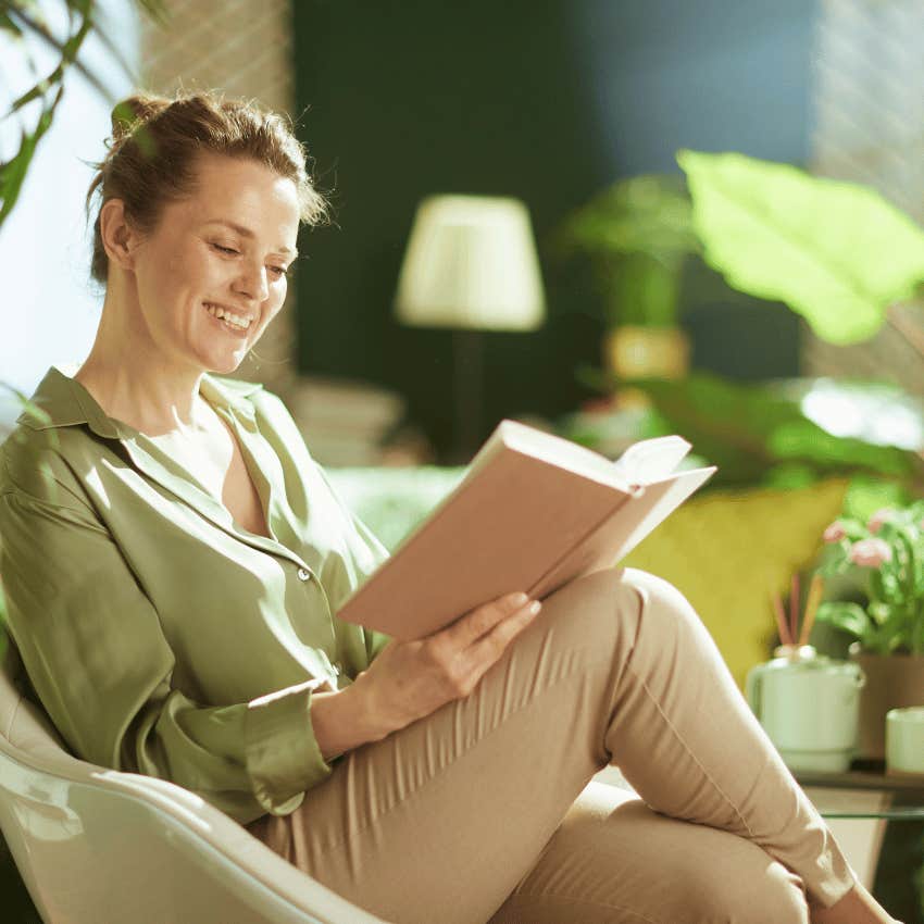 woman enjoying life to the fullest reading