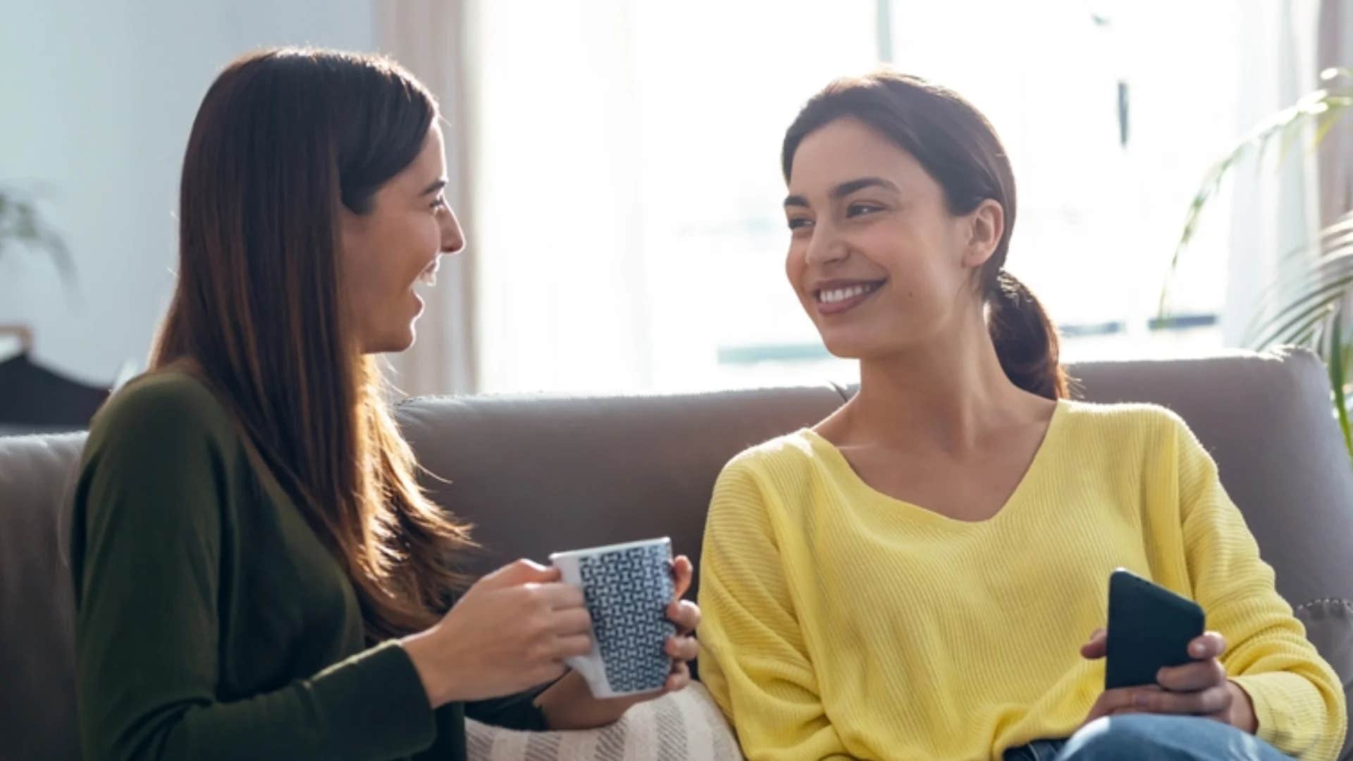 woman telling friend must be nice