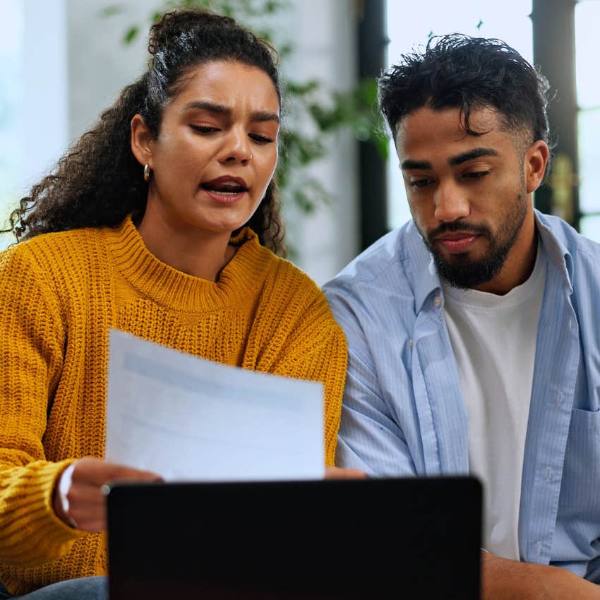 Woman saying "don't forget you have that" to her husband at home.