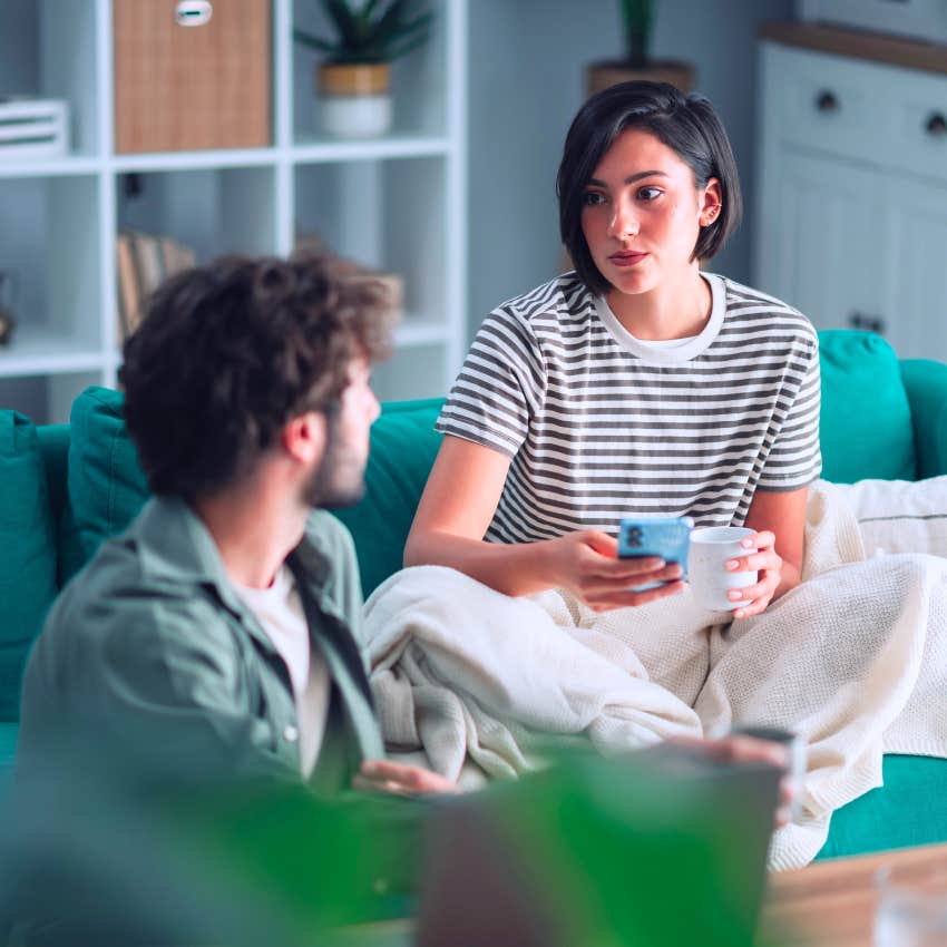 Woman saying "I'll figure it out" to her husband at home.