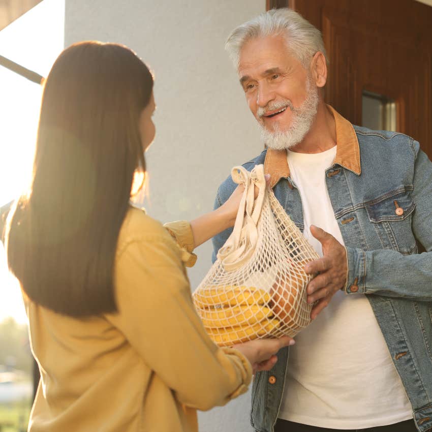 Gen X woman doing a favor for her boomer neighbor