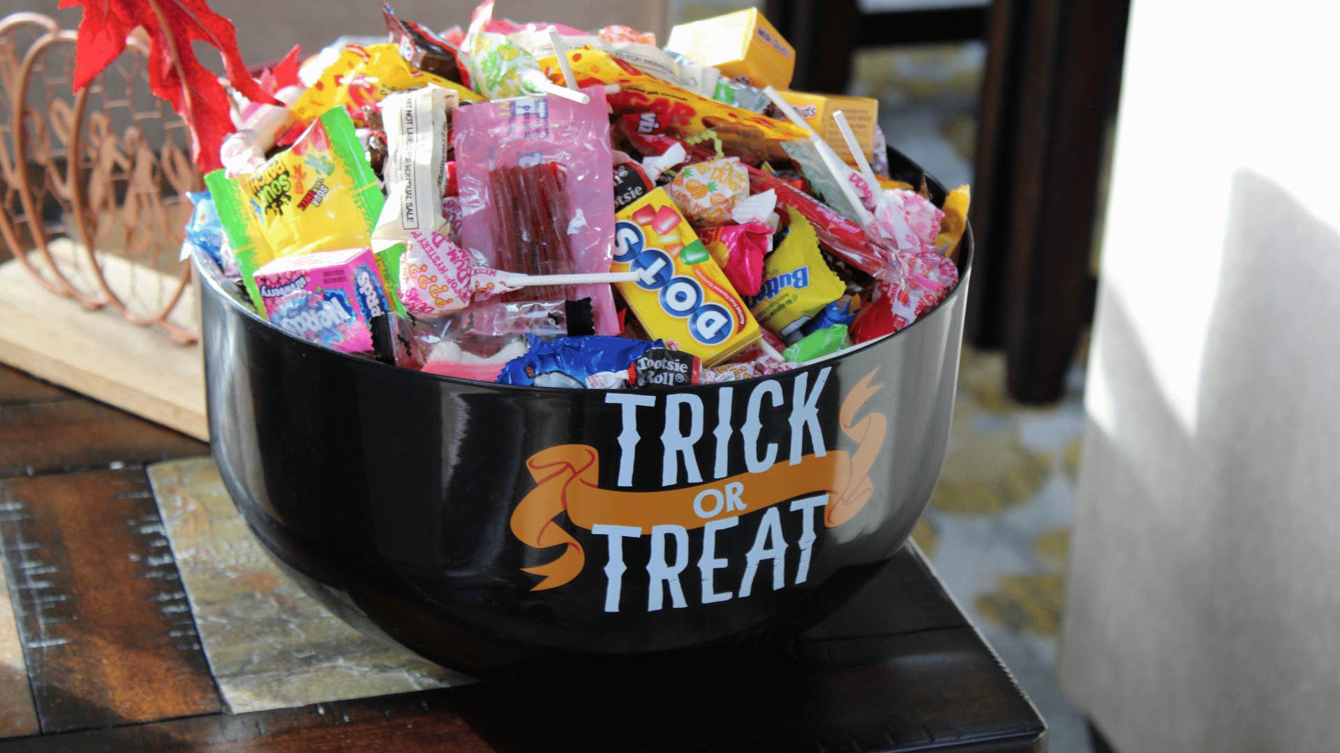 mountains of candy in trick or treat bucket