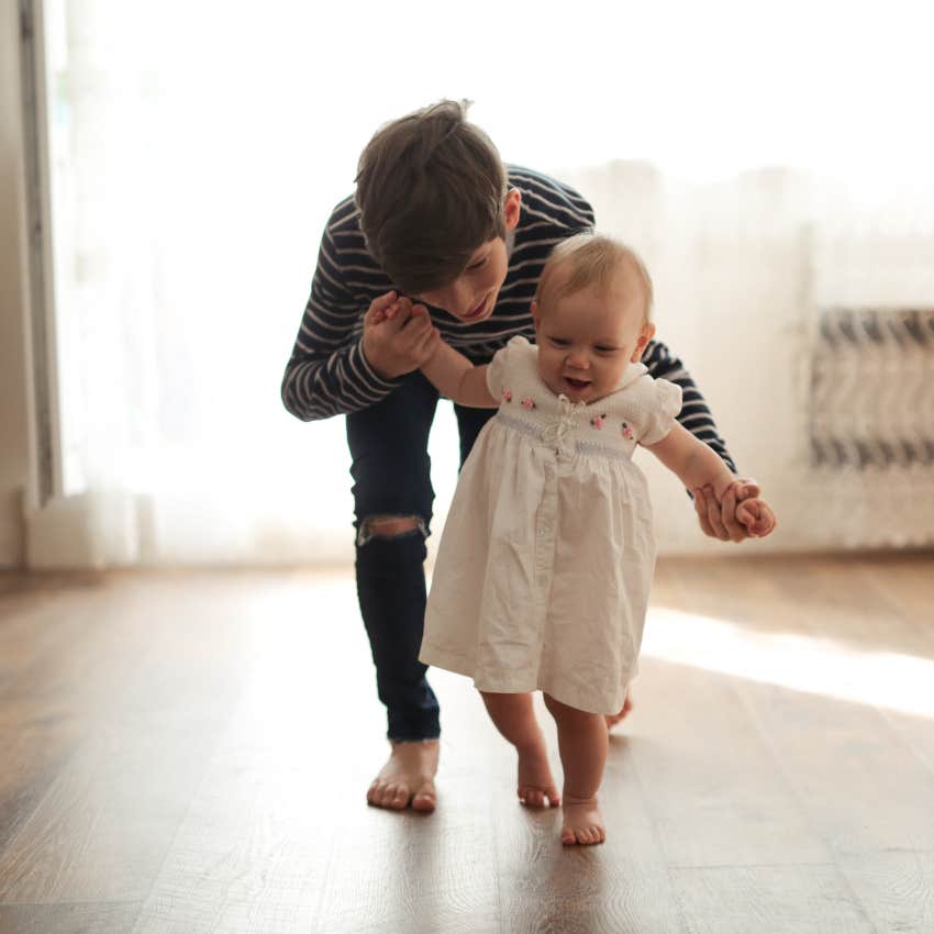 big brother helping to care for baby sister and forced to grow up too fast