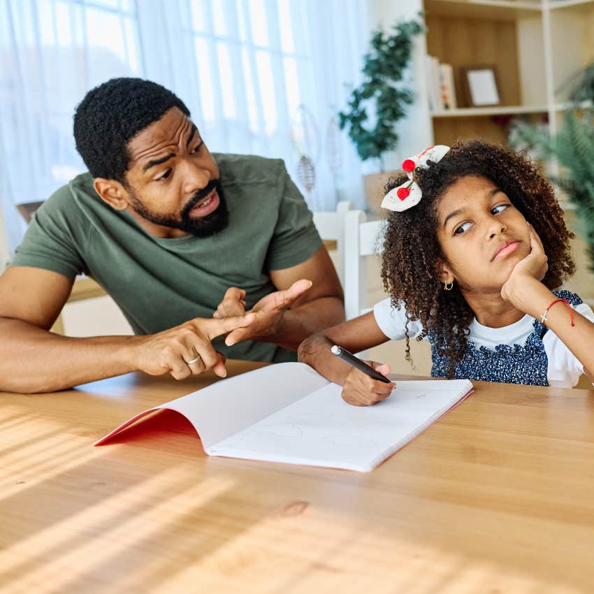 little girl pressured by her dad to be the best at school 
