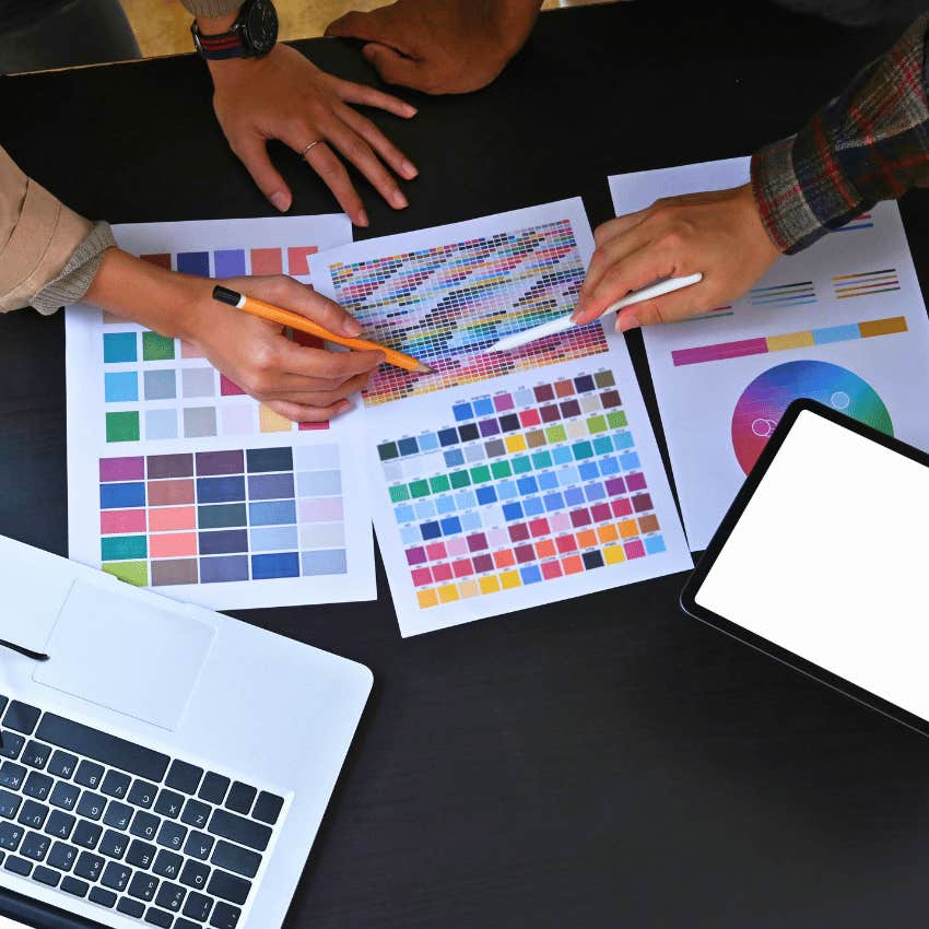 colleagues brainstorming for project using a color chart