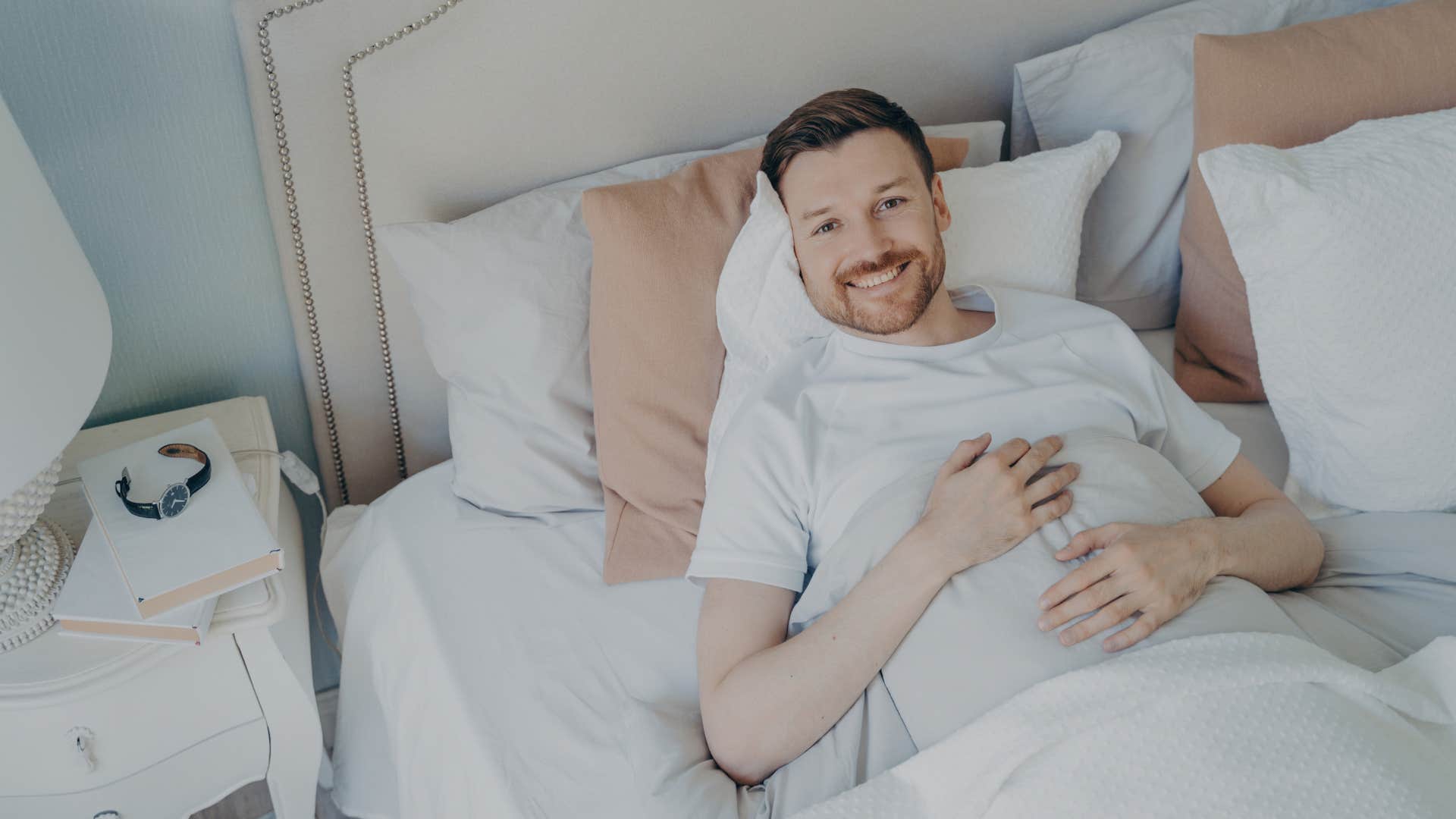 man who needs to arrange his pillows just right to be comfortable 