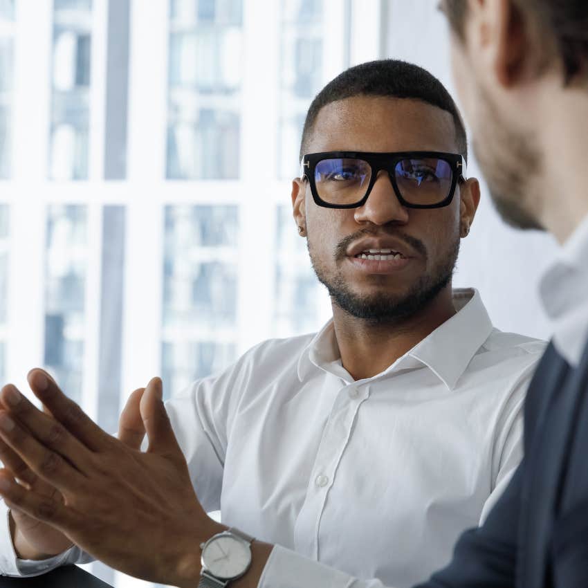 gen z employee getting impatient with co-worker telling him to run it up the flagpole