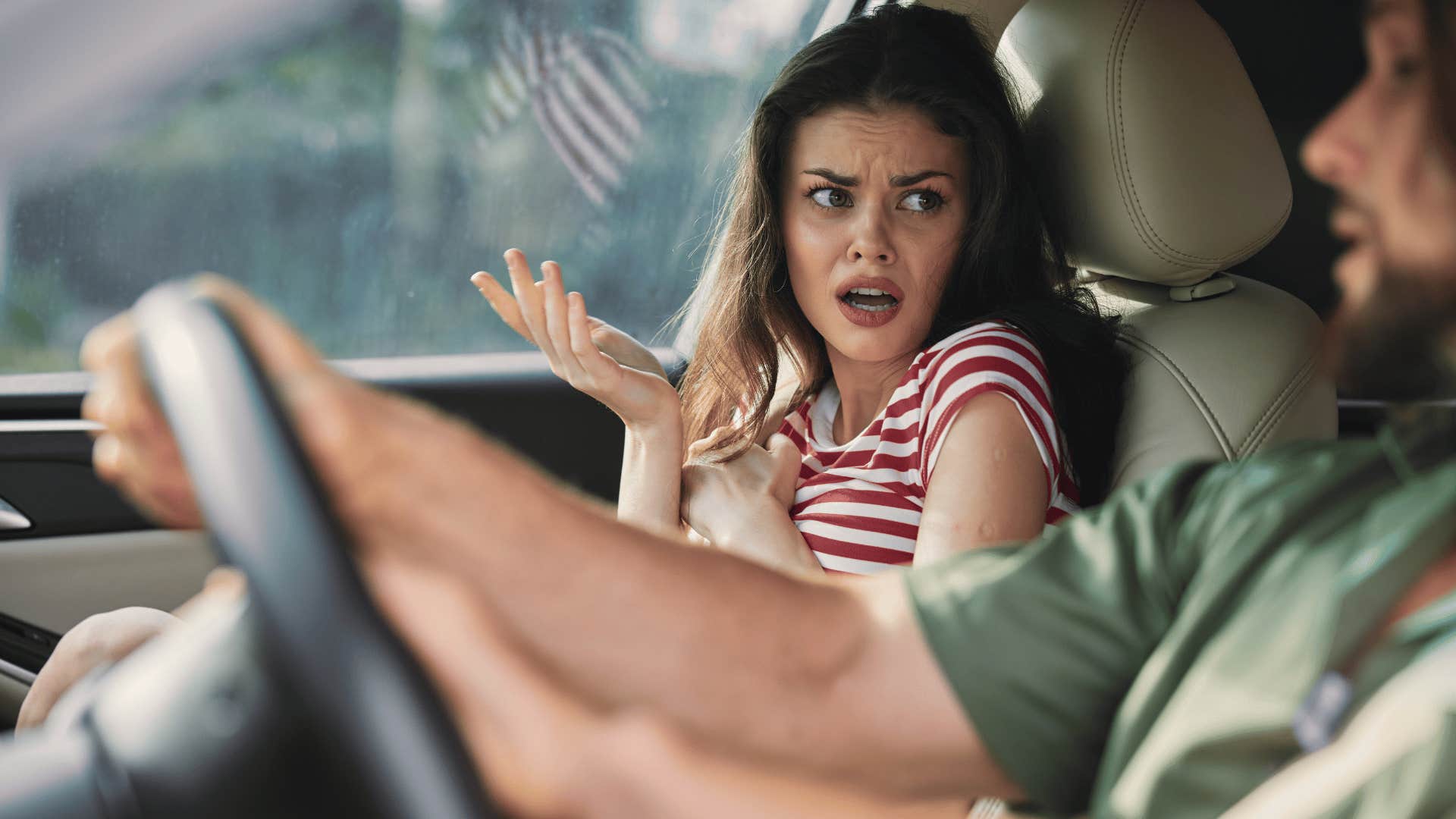 couple arguing in the car as they can't decide what to eat for dinner