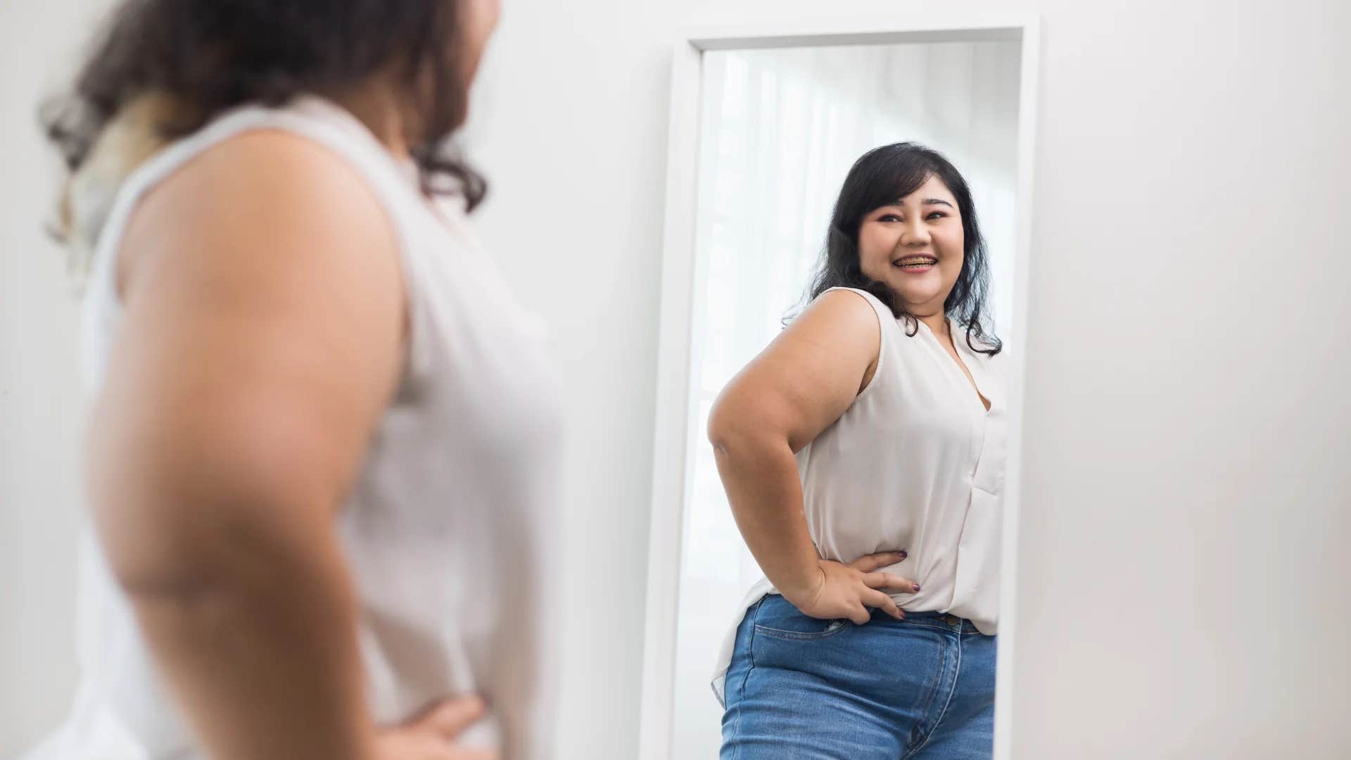 deeply charismatic woman telling herself i give love because i am an open vessel