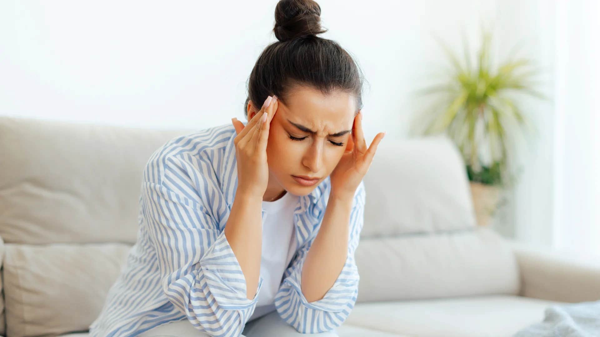 stressed millennial woman worried about a midlife crisis