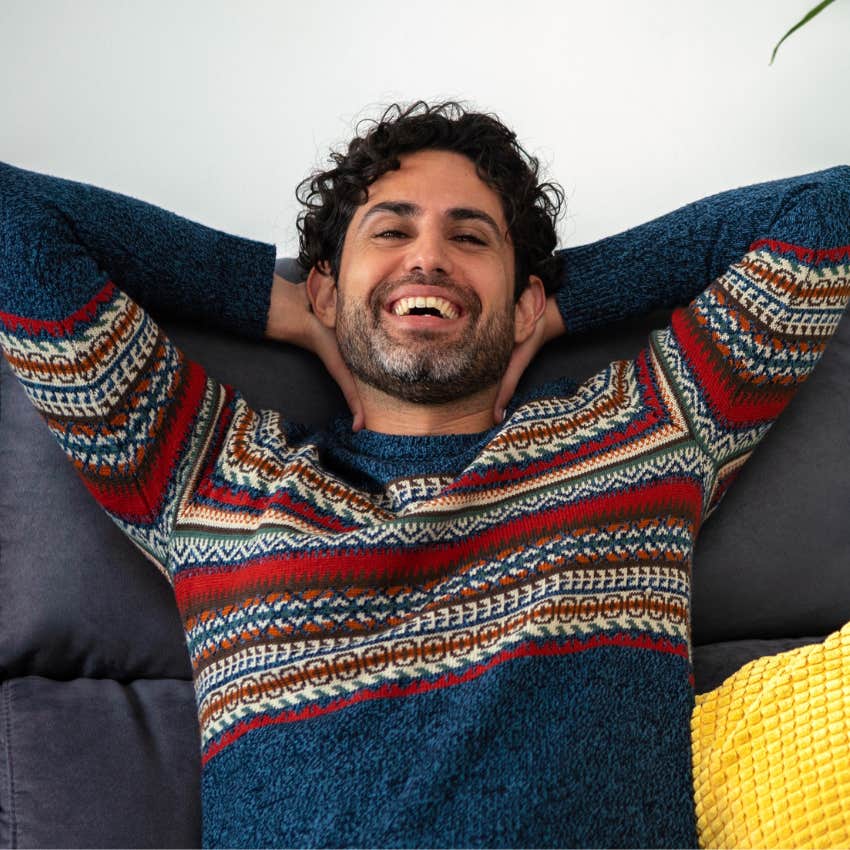 unbothered man relaxing at home not dwelling in the past