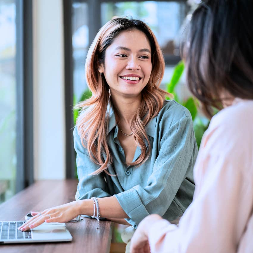 emotionally intelligent woman talking to colleague and saying let's find the answer together